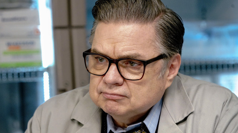 Oliver Platt in tan suit coat