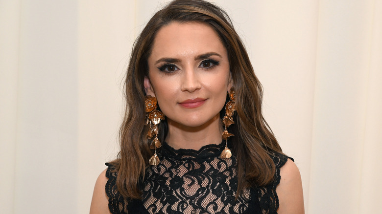 Rachael Leigh Cook wearing black lace dress