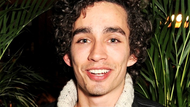 Robert Sheehan smiling