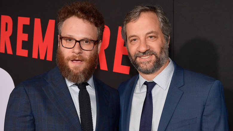 rogen and apatow side by side in suits