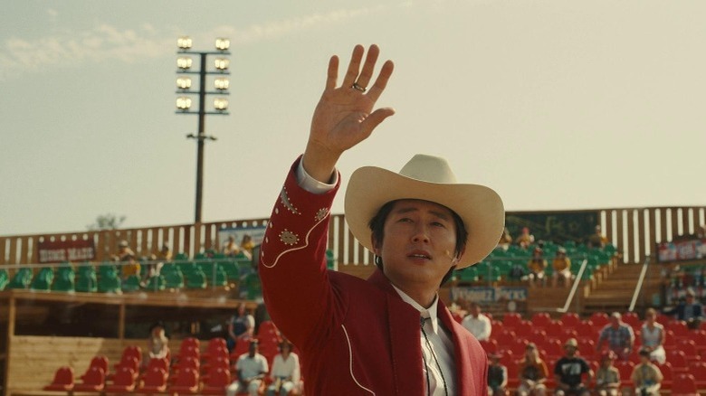 Ricky "Jupe" Park holding up his hand while looking at the sky