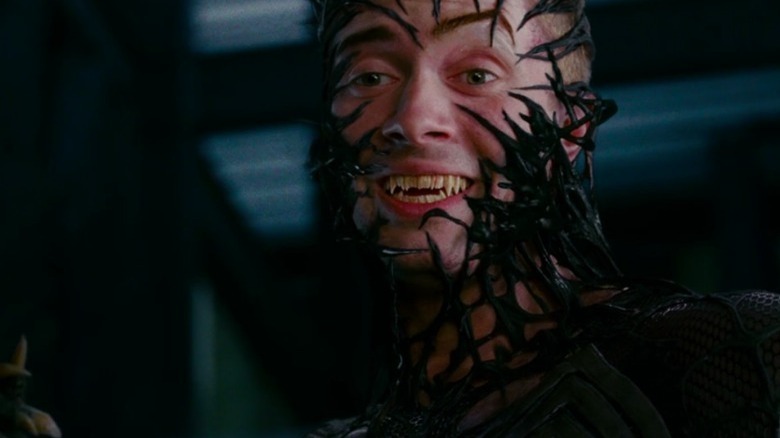 Eddie Brock transforms into Venom