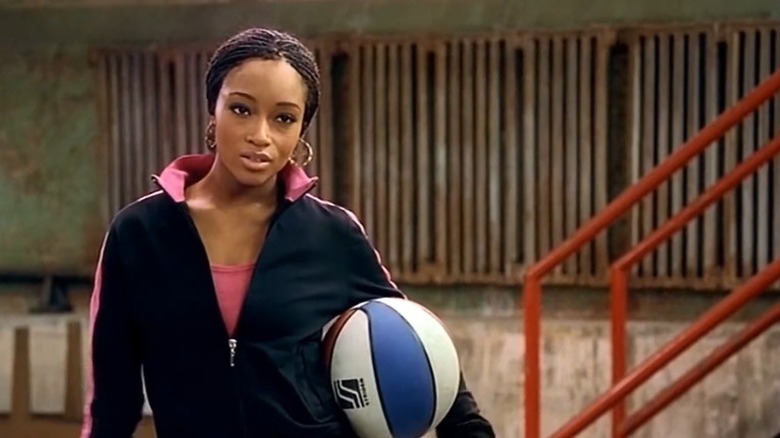 LaRhette Dudley holding a basketball
