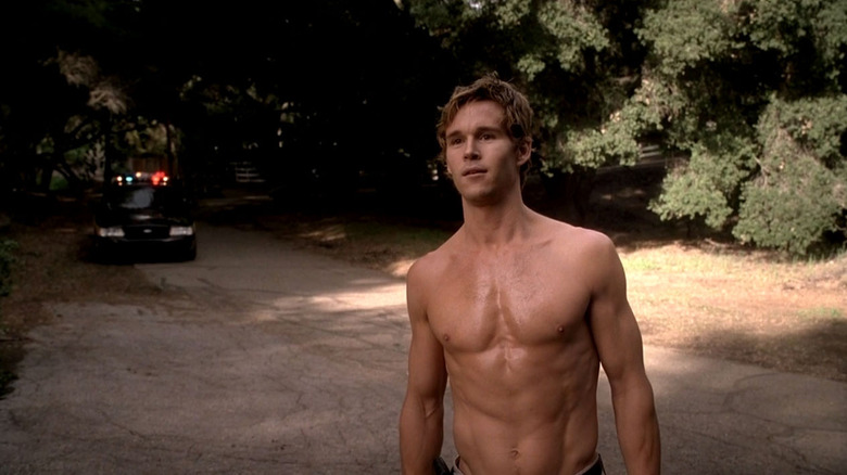 Jason standing in the street shirtless True Blood