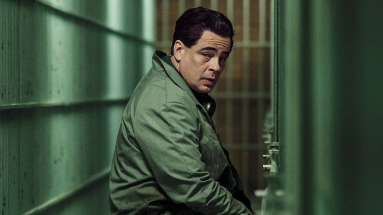 Richard Matt (Benicio del Toro) sitting in his cell in 