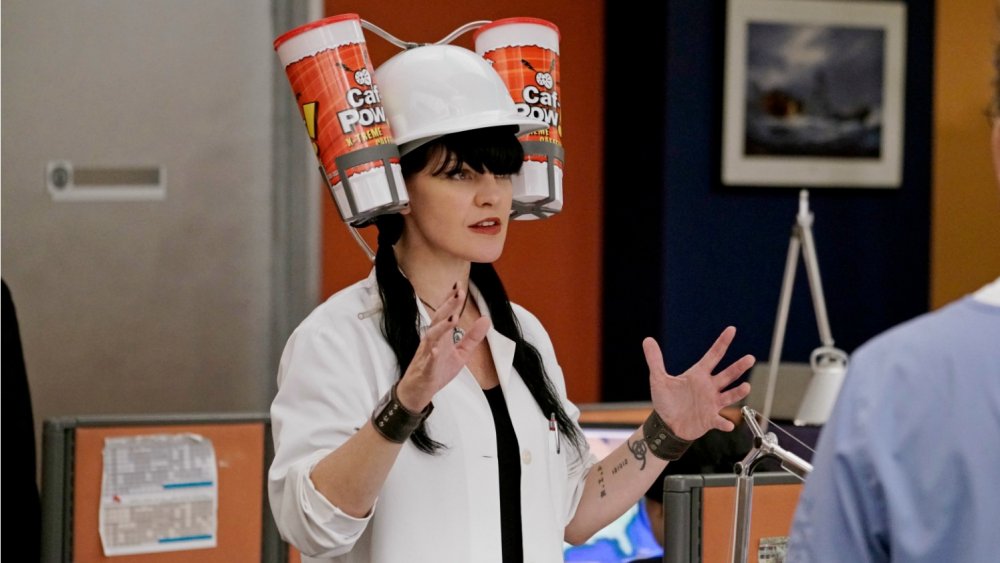 Pauley Perrette as Abby Sciuto shows off her Caf-Pow version of a beer hat in NCIS