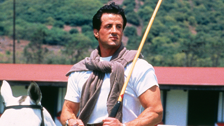 Sylvester Stallone riding polo horse