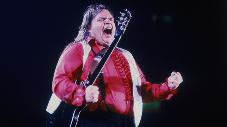 Meat Loaf with a guitar