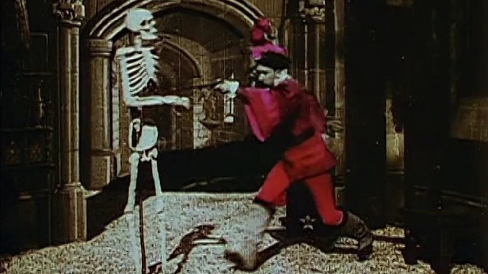 The cavalier is menaced by a skeleton in The Devil's Castle