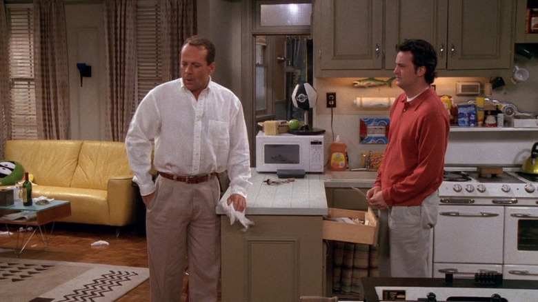 Paul Stevens and Chandler in kitchen