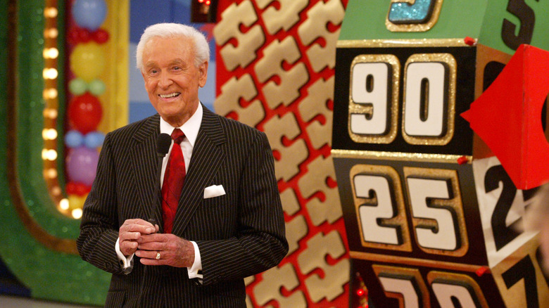 Bob Barker smiling next to the showcase wheel