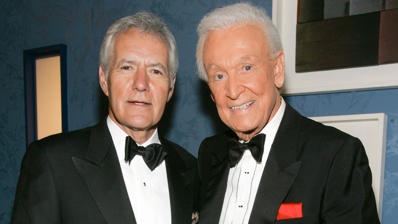 Bob Barker posing with Alex Trebek