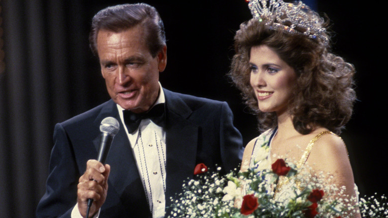 Bob Barker on stage with Miss USA