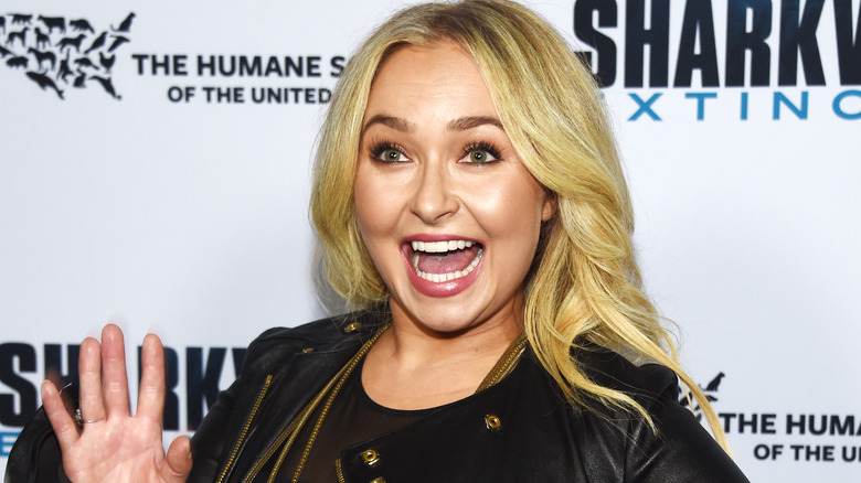 Hayden Panettiere joking around on a red carpet