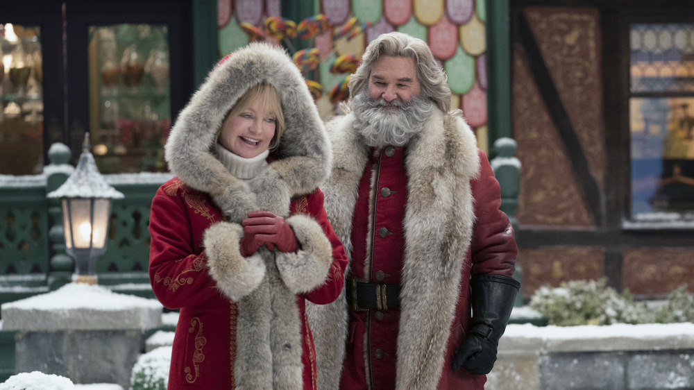 Kurt Russell and Goldie Hawn as Santa Claus and Mrs. Claus