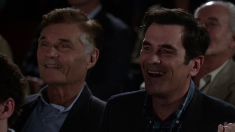 Frank and Phil Dunphy watch a school play