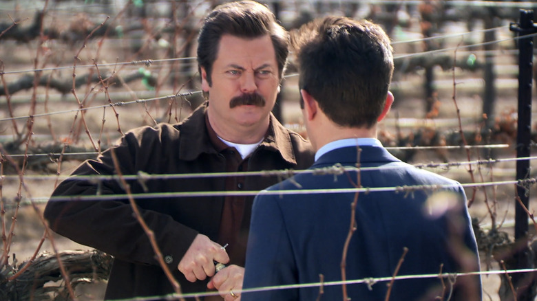 Ron Swanson outside opening wine