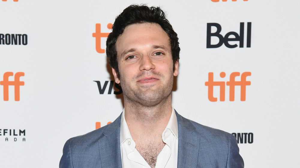 Jake Epstein at an event posing