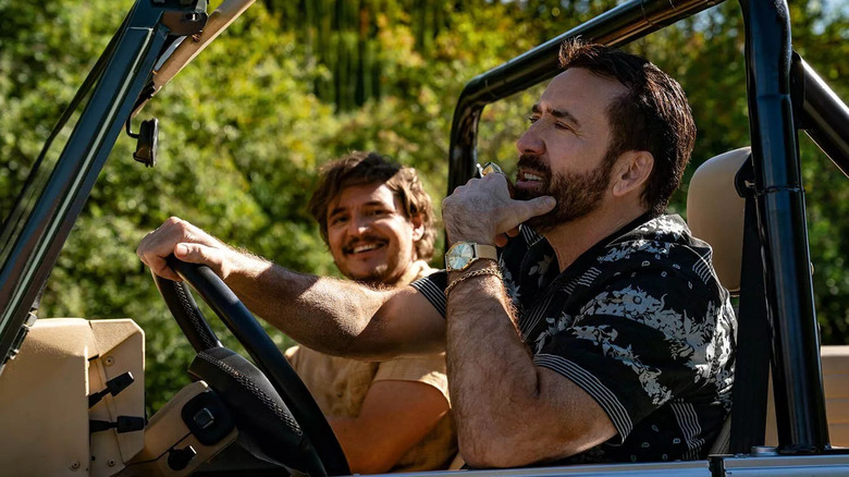 Nick and Javi riding in a jeep
