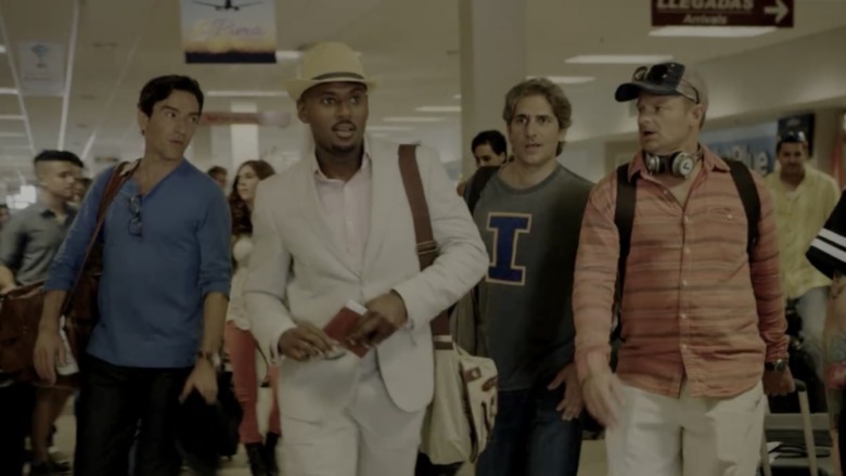 Ben Chaplin, Michael Imperioli, Romany Malco, and Steve Zahn in Mad Dogs at the airport