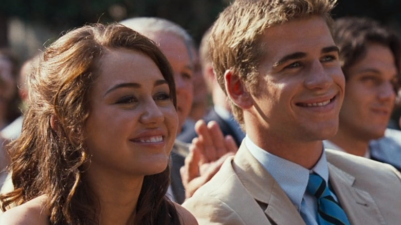 Miley Cyrus, Liam Hemsworth smiling