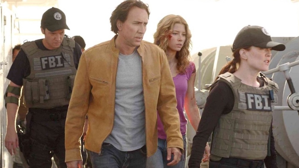 Jason Butler Harner, Nicolas Cage, Jessica Beil, and Julianne Moore charging into action in Next