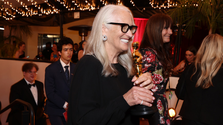 Jane Campion holding her Oscar