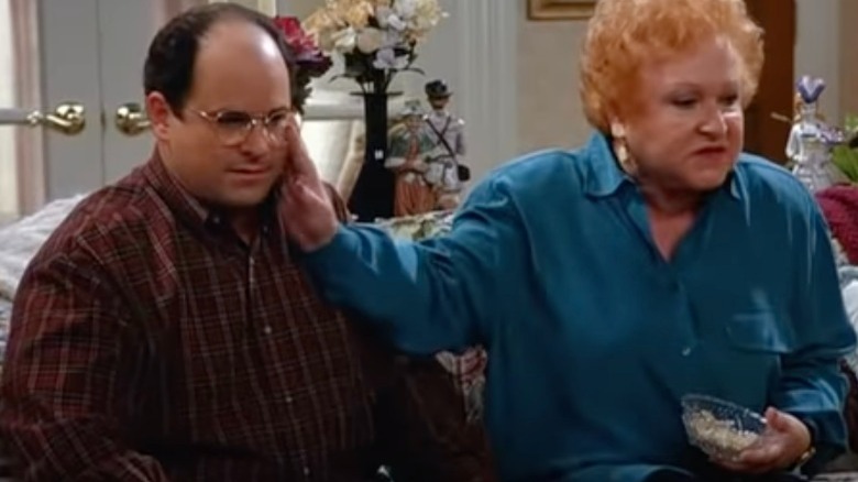 George and Estelle Costanza sitting on a couch