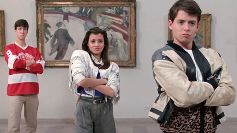 Cameron, Sloane, Ferris crossing their arms at the art museum
