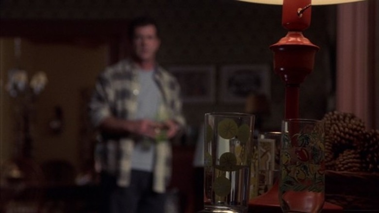 Mel Gibson glaring at water glass