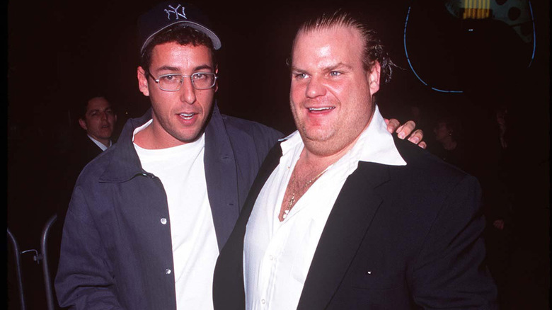 Adam Sandler hugging Chris Farley