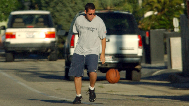 Adam Sandler playing basketball