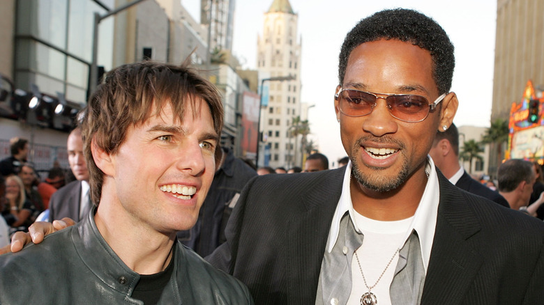 Tom Cruise and Will Smith smiling 