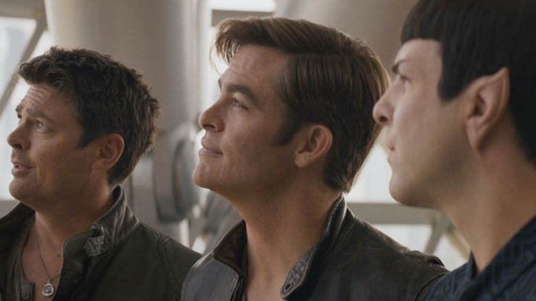 McCoy, Kirk, and Spock looking up together