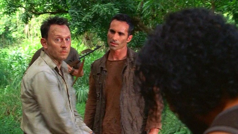 Richard holding Ben Linus captive