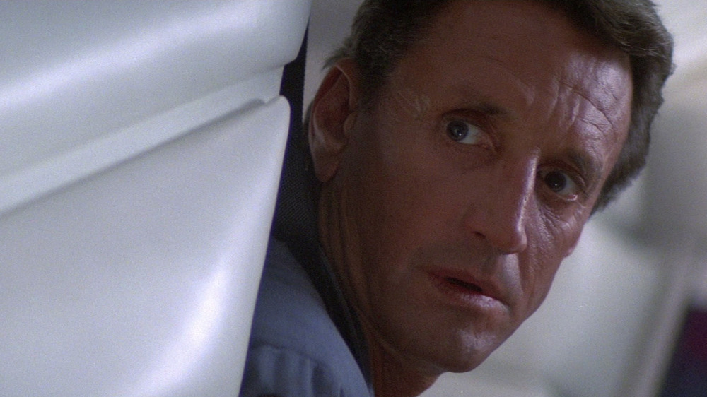 Roy Scheider stares