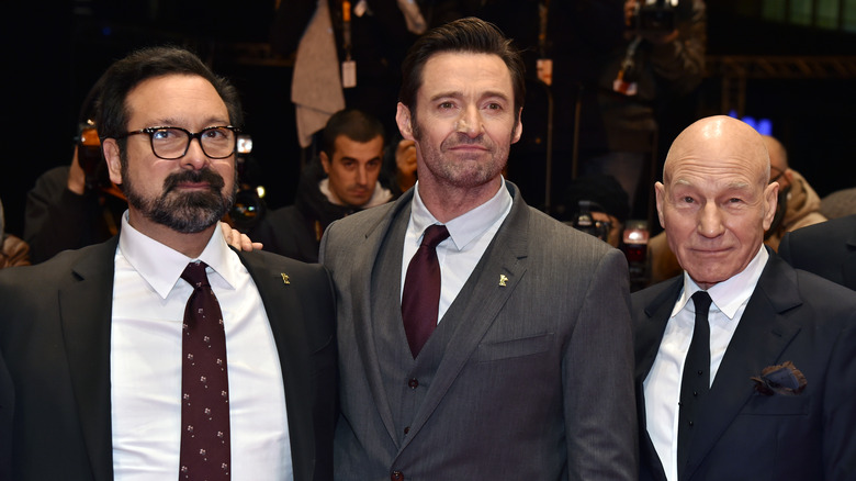 James Mangold, Hugh Jackman, and Patrick Stewart smiling