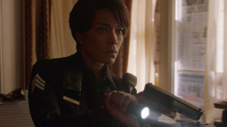 Angela Bassett as Athena aims