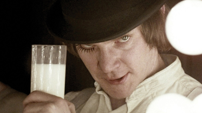 Alex DeLarge drinking a glass of milk