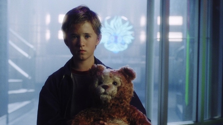 Haley Joel Osment and Teddy in the city