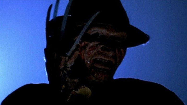 Freddy Krueger holding up glove