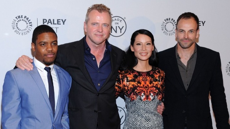 John Michael Hill, Aidan Quinn, Lucy Liu, Jonny Lee Miller