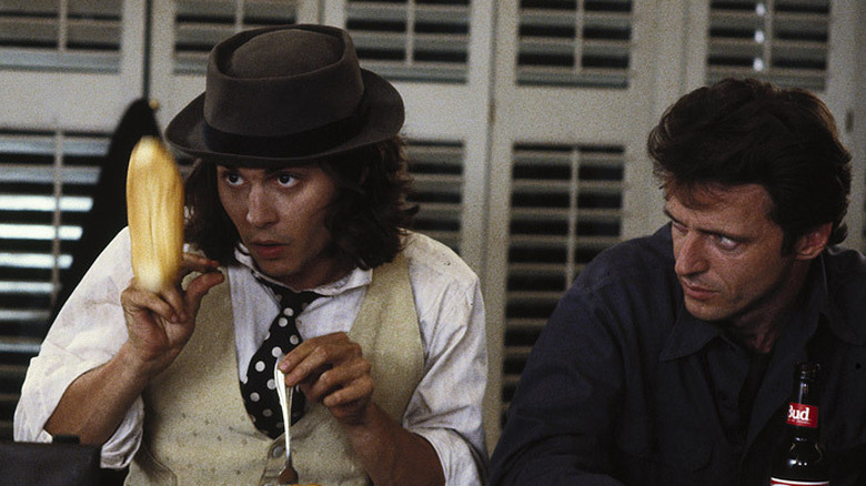 Aidan Quinn glares at Johnny Depp in Benny and Joon