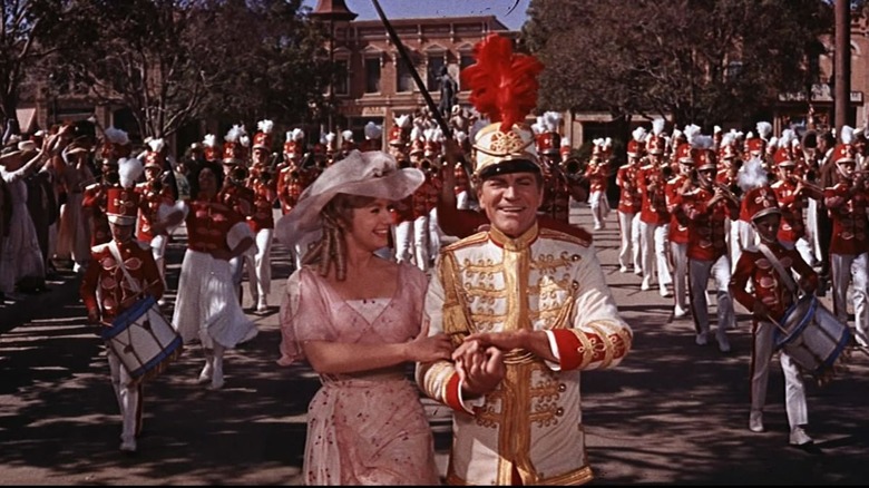 Robert Preston and Shirley Jones smiling in parade