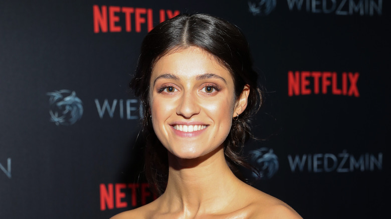 Anya Chalotra grinning Witcher premiere