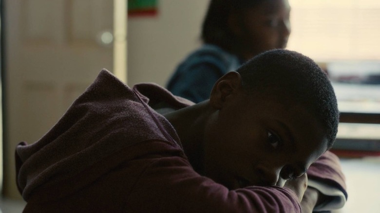 Student with head on desk