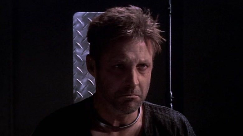 Bruce Boxleitner as John Sheridan in prison on Babylon 5.