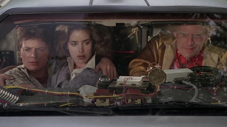 Marty, Jennifer and Doc Brown inside the DeLorean