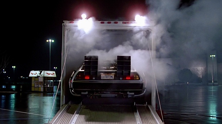 The DeLorean backs out of the truck