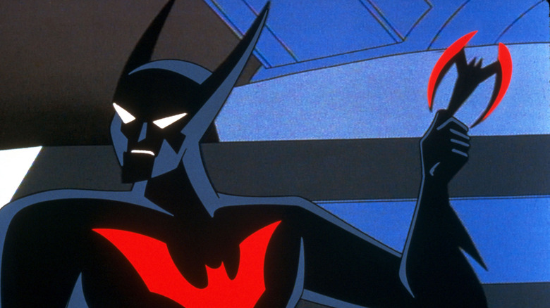 Batman Beyond holding a batarang